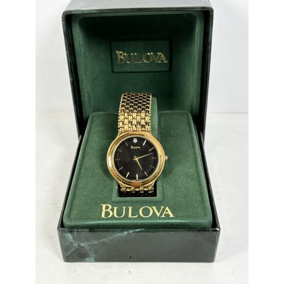 Bulova Men's Gold-Tone Diamond Accent Watch model number 97D127.